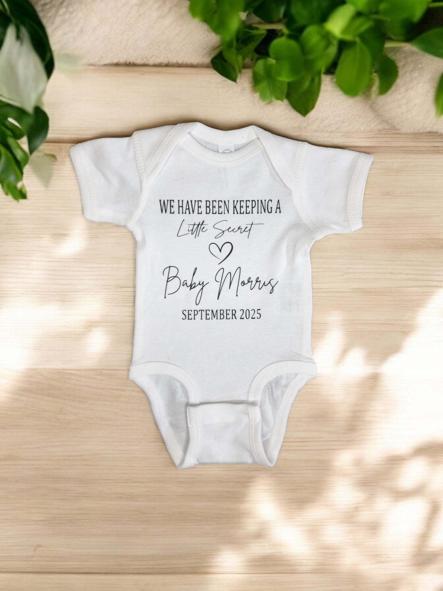 Custom "We Have Been Keeping a Little Secret" Baby Announcement Bodysuit