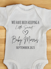 Custom "We Have Been Keeping a Little Secret" Baby Announcement Bodysuit